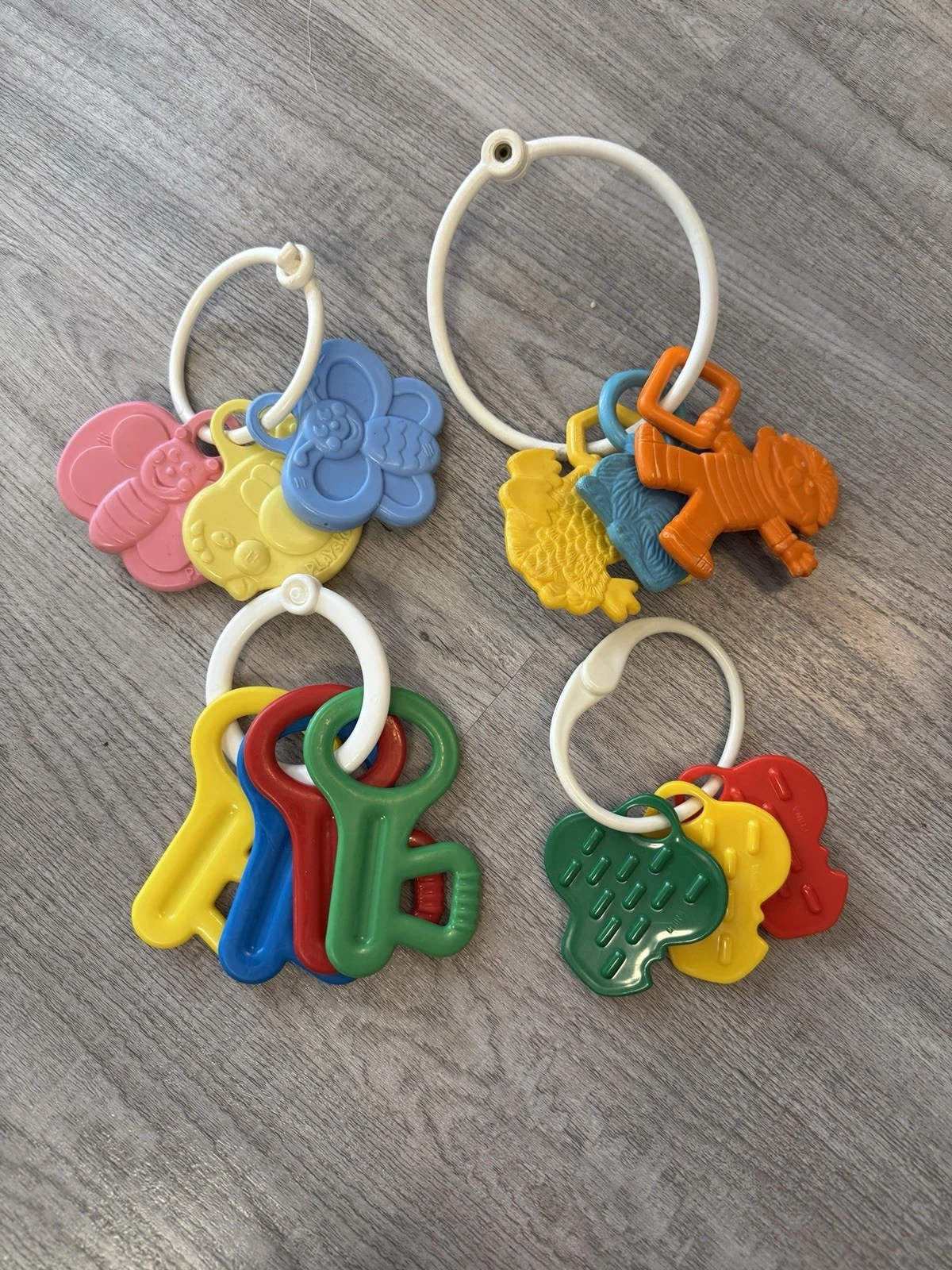 VTG Hard Plastic Baby Keys Sesame Street Discs Teething Toys on Chain Mixed Lot
Opens in a new windo