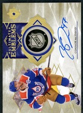 2023/24 Upper Deck Ultimate Emblems Gold Connor McDavid Auto /25