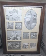 Wooden Wall Mount Jewelry Organizer/Cabinet With A Variety Pictures On The Front