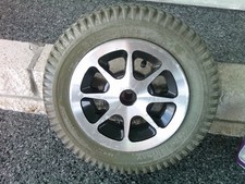 3.00-8 Gray Pneumatic Tire On An 8 Spoke Silver Rim Blemished 5495