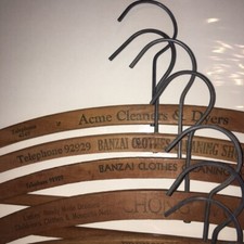 VINTAGE WOODEN CLOTHES HANGERS, 9 ASSORTED