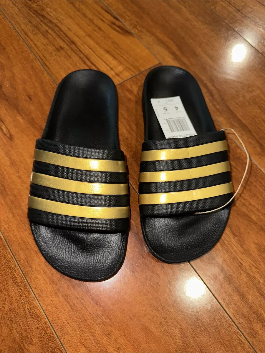 Gold adidas hotsell slides womens