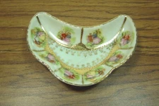 VINTAGE CRESCENT  SHAPED BONE DISH WITH VICTORIAN MAN & LADY SCENES