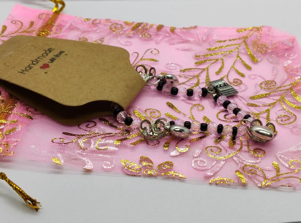 Pulsera elástica hecha a mano con corazón y libro de amor infantil con bolsa de regalo Foto 2 de 4