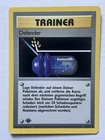 1st Edition Defender 80/102 German Base Set WOTC Vintage Pokemon Trainer Card NM