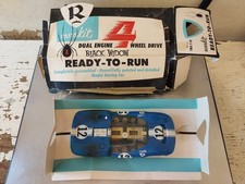 Russkit Black Widow Lola T-70 Ready to Run with Box - Never Run Vintage Slot Car