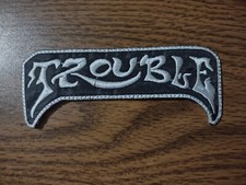 TROUBLE,SEW ON WHITE WITH WHITE BORDER EMBROI...