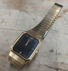 Seiko Quartz Watch - 80s Vintage, Gold Tone, Black Rectangular Face - 5P30-5290