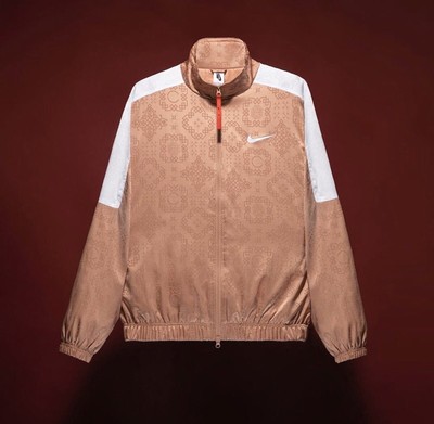 nike rose gold track jacket