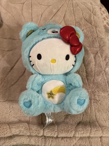 Hello Kitty X Care Bears Plüschtier hellblau Sterne Bauch Top Zustand