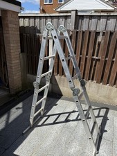 Multi purpose folding ladder