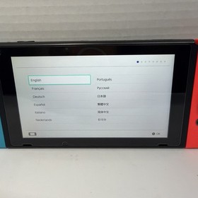 Nintendo Switch V1 Bundle - Neon Joy-Cons, DreamGear Grip, Hotel Transylvania 3