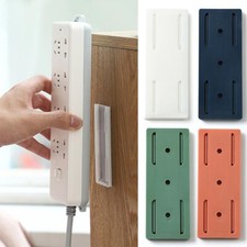 4x Socket Holder Plug Fixer Wall-Mounted Power Strip Holders Sticker Punch-free