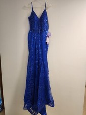 NEW prom dress size 4 - figure shaping dress, fits snug. Gorgeous sequin.