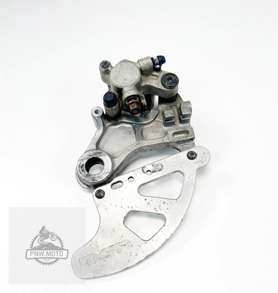 Оригинальный кронштейн суппорта заднего тормоза для 2000 Honda CR500R CR 500R 1989–2001 годов выпуска - Изображение 2 из 4