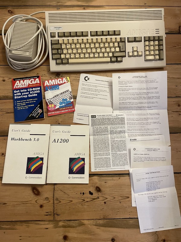 Commodore Amiga 1200 computer with 60Mb HDD, PSU, original Books. Tested Working