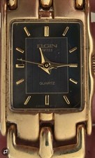 Reloj Elgin Damas Tono Dorado Negro Gris Tono Cara Necesita Batería VENDIDO Como Está