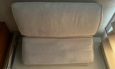 Beige Fabric Upholstered Sofa Bed with Backrest and Cushions