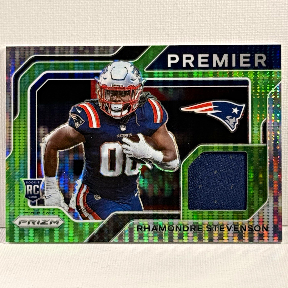 Rhamondre Stevenson Panini Prizm Premier Jersey #PJ29 Neon Green Pulsar
