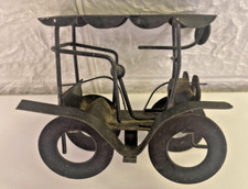 Antique black iron car like 1913 Ford Model T Roadster