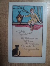 HALLOWEEN Boy on Wall w/ Strange J-O-L & Black Cat vintage Bergman Postcard
