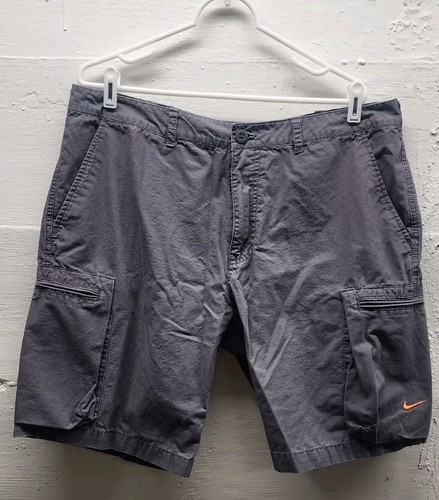 Nike Golf Cargo Shorts Reißverschlusstaschen Herren Gr. 36 grau orange - Bild 1 von 3