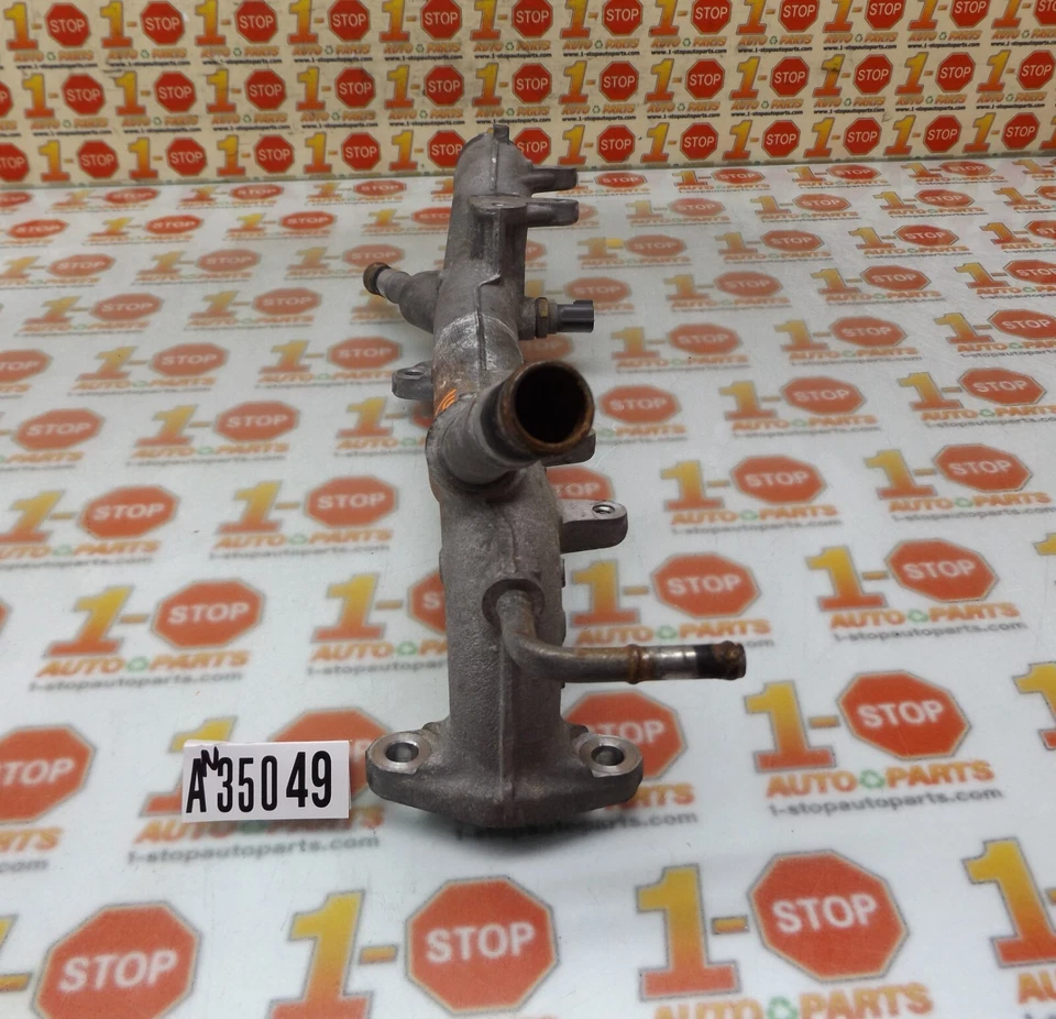 Nissan Murano 2008-2014 refrigerante crossover salida de agua 11060-JA10A OEM Foto 2 de 4