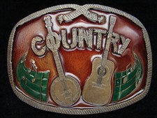 OF01144 NOS VINTAGE 1976  COUNTRY MUSIC  COMMEMORATIVE INDIANA METAL BUCKLE