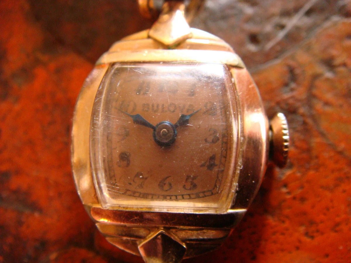 14k rolled gold bulova plate