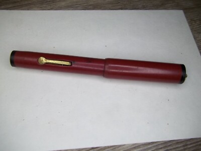 Vintage ink pen made to hang around your nrck has loop in top of pen      Z42