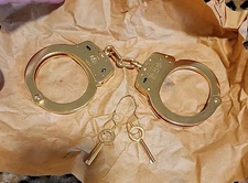 New in Box! Smith and Wesson Model 100 24kt Gold Plated Handcuffs