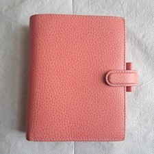 Filofax Finsbury Pocket coral.  Real Leather with some Inserts. Used.