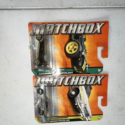 Matchbox 1:64 Diecast 2-Car Lot Caterham R500 Superlight & Dodge Monaco Unopened
