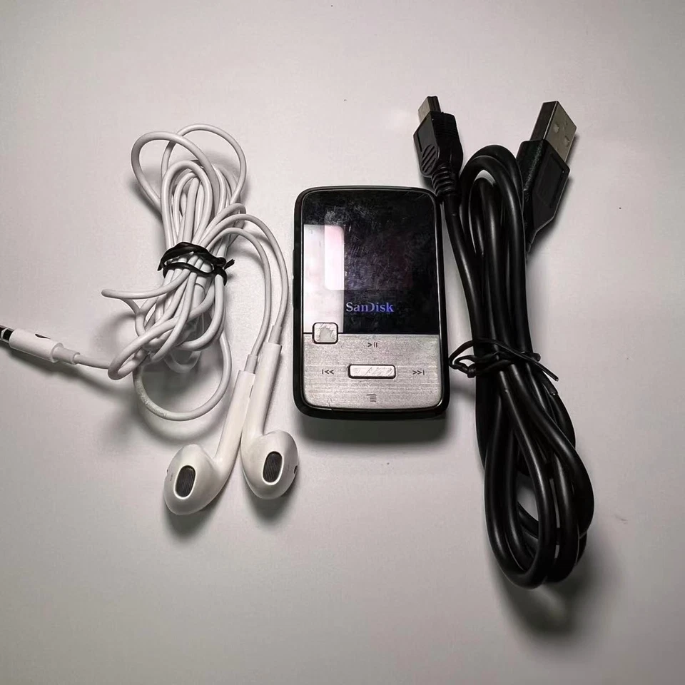 Reproductor multimedia digital SanDisk Sansa Clip Zip (4 GB) MP3 y paquete de cable usado Foto 3 de 4