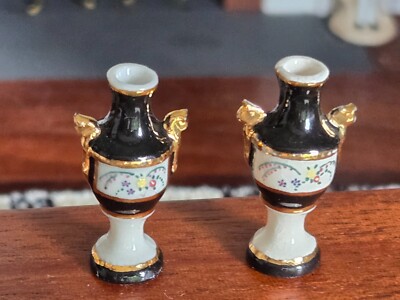 Lot 159 - A pair of Royal Ivory porcelain spill vases