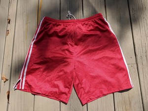 white adidas shorts with red stripes