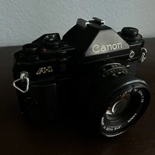 Canon A-1 35mm Camera with 50mm FD Lens (Black)