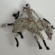 VINTAGE UNSIGNED CORO ENAMEL RHINESTONE COWBOY ON BUCKING BRONCO BROOCH
