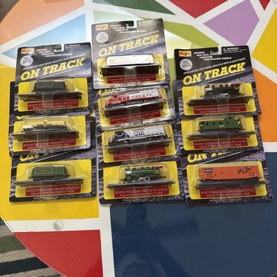 VTG Lot Of 10 Mixed Maisto On Track Die-Cast Locomotives, Train Cars. Etc. - NIP