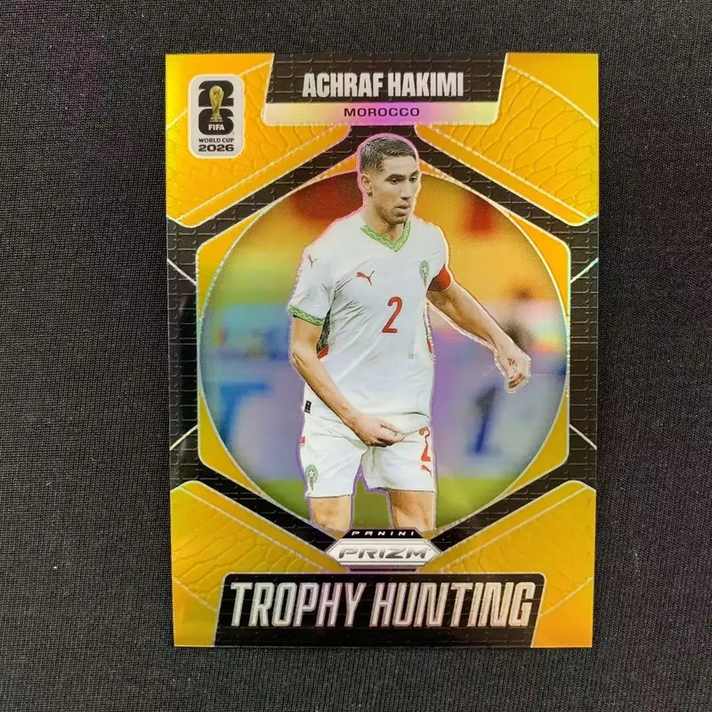 2026 PANINI PRIZM WORLD CUP #14 ACHRAF HAKIMI TROPHY HUNTING GOLD /10 XR79