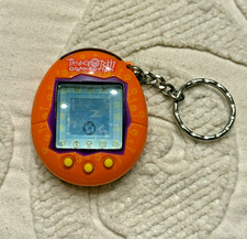 Tamagotchi Connection V1 2004 Orange  Purple trim - Tested