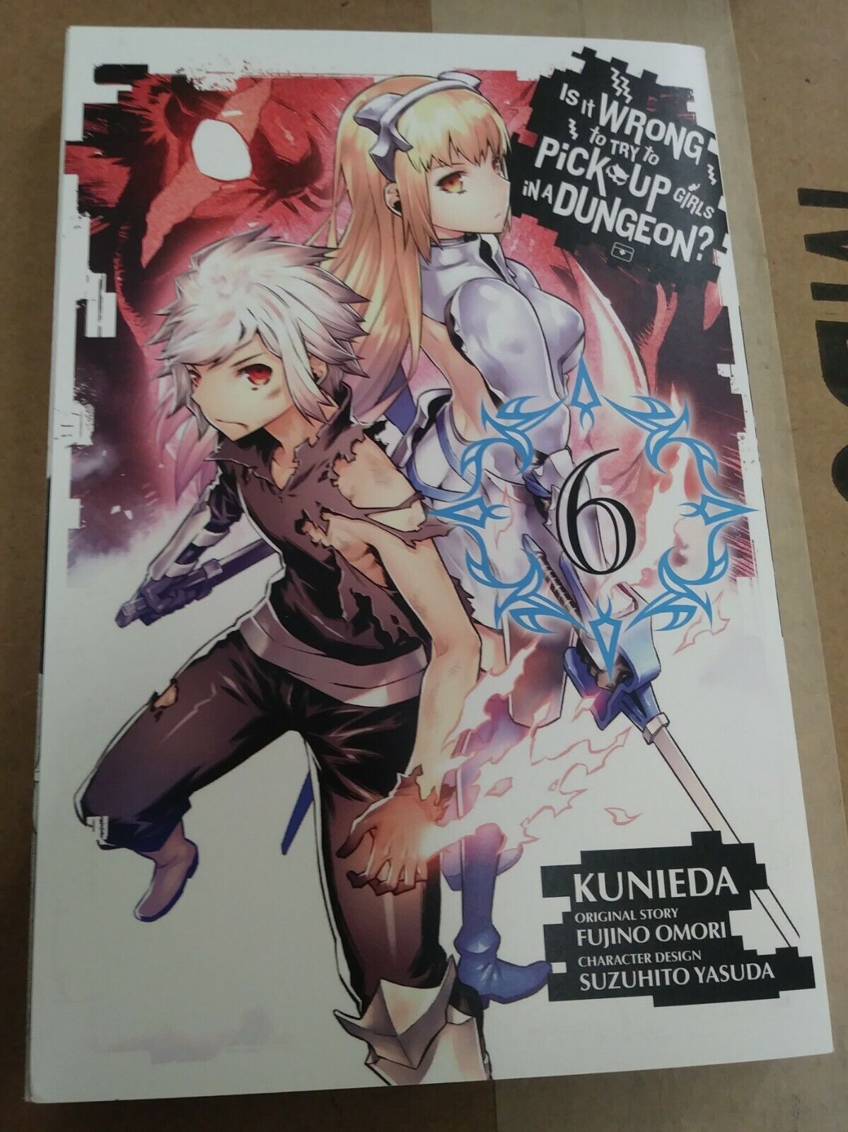 Is It Wrong to Try to Pick Up Girls in a Dungeon? Manga Volume 4