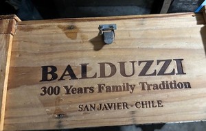 Three vintage wooden wine boxes - names of wines and locations stamped into wood