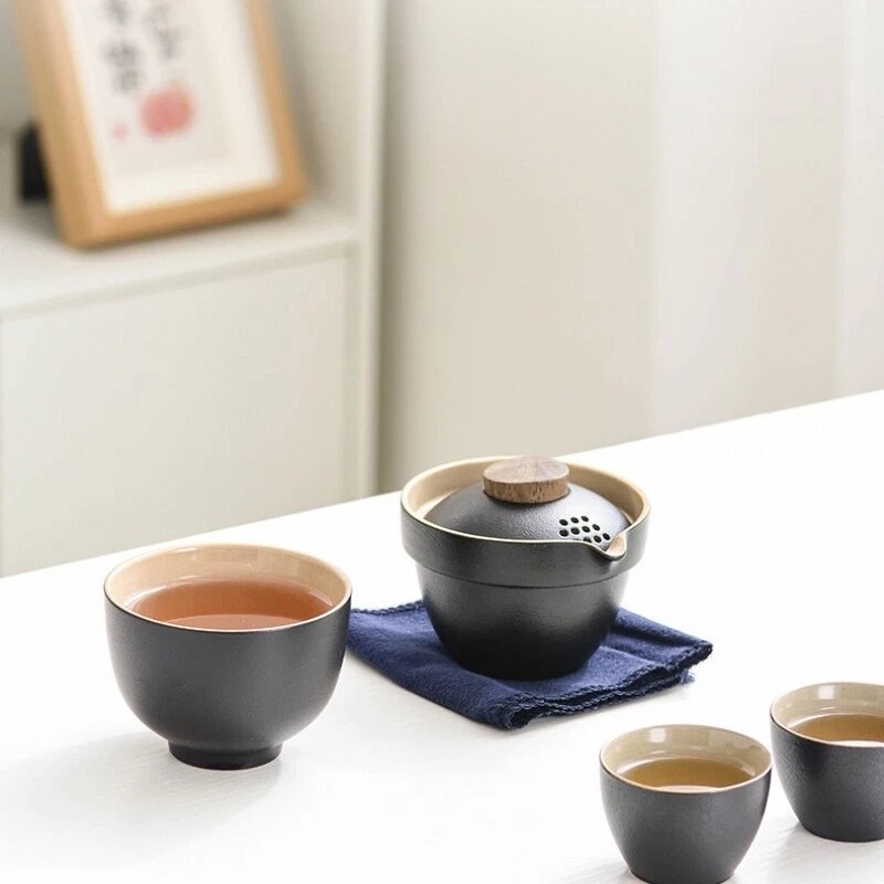 中国茶具黑色陶器便携式茶具锅带浸泡孔袋茶杯 — 第 2/4 张图片