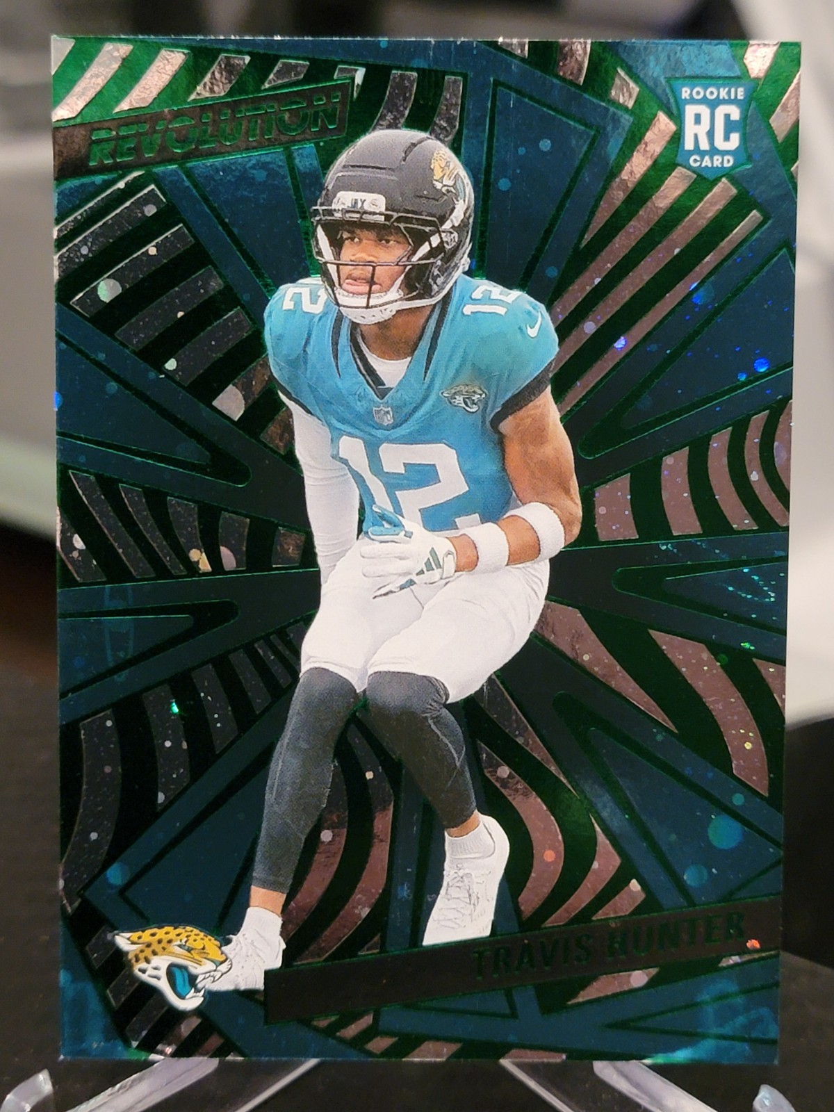 2025 Panini Revolution - Rookies Travis Hunter #242 Green Cosmo /199 (RC)