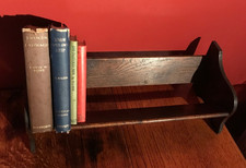 FREESTANDING VINTAGE BOOK SHELF TROUGH BOOK REST, IN DARK WOOD.  46cm x 17.5cm.