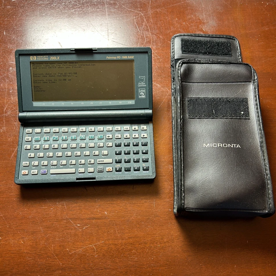 De colección Hewlett Packard HP 200LX Palmtop PC 1MB RAM Estuche De Colección Probado Funcionando Foto 2 de 4