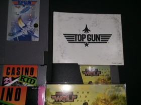 Nes Lot of 4. All With Manuals. Pac Man, Top Gun. Casino Kid. Bid Starts At $1