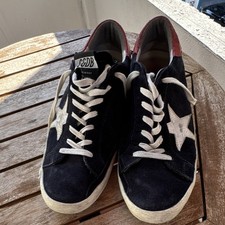 Golden Goose Super-Star baskets basses à lacets noir blanc rouge homme EU 43