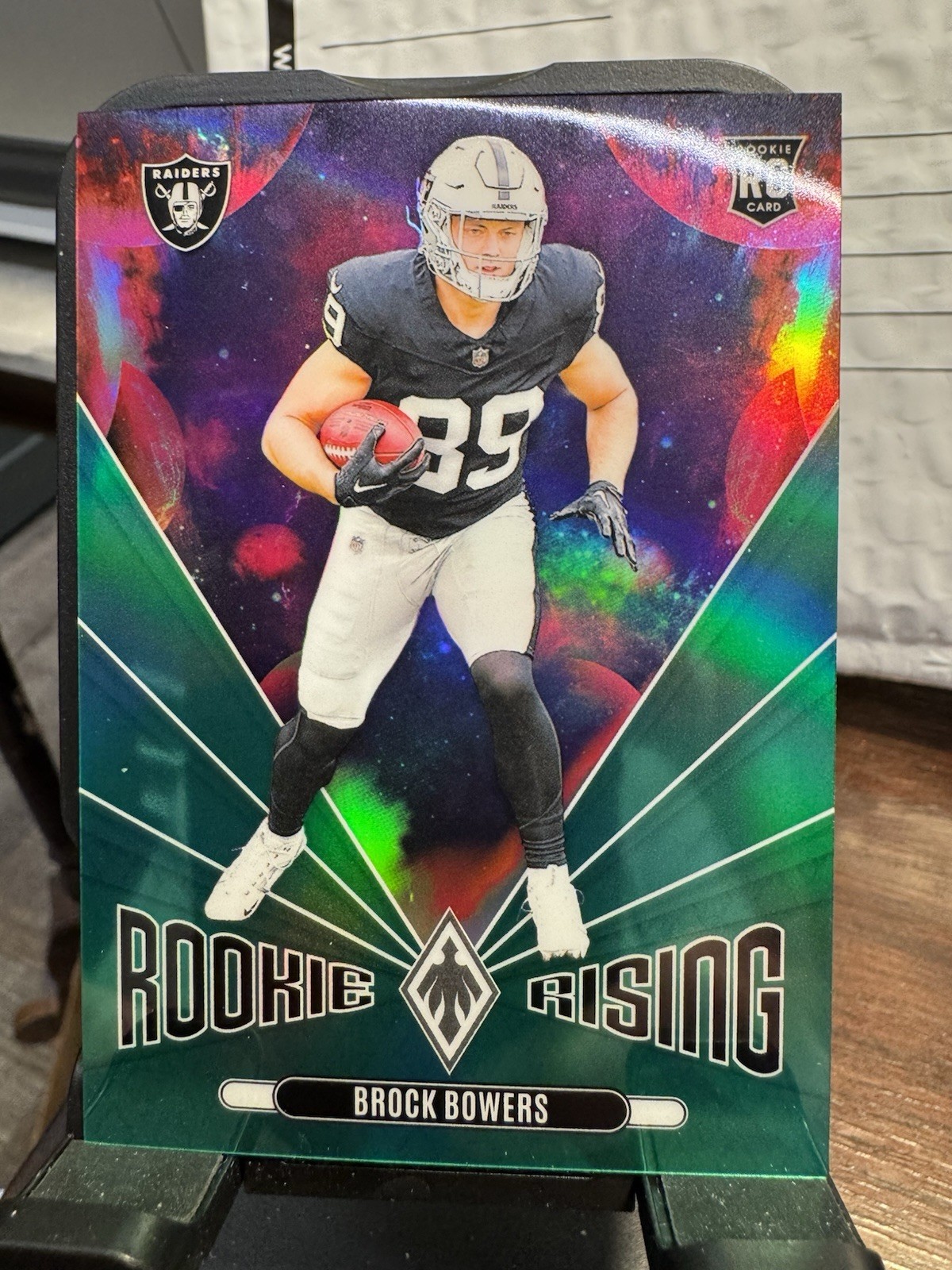 2024 Panini Phoenix - Rookie Rising Brock Bowers #RR-BBS Green /25 (RC)
